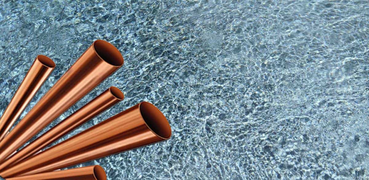 image of copper pipes overlayed in a swimming pool