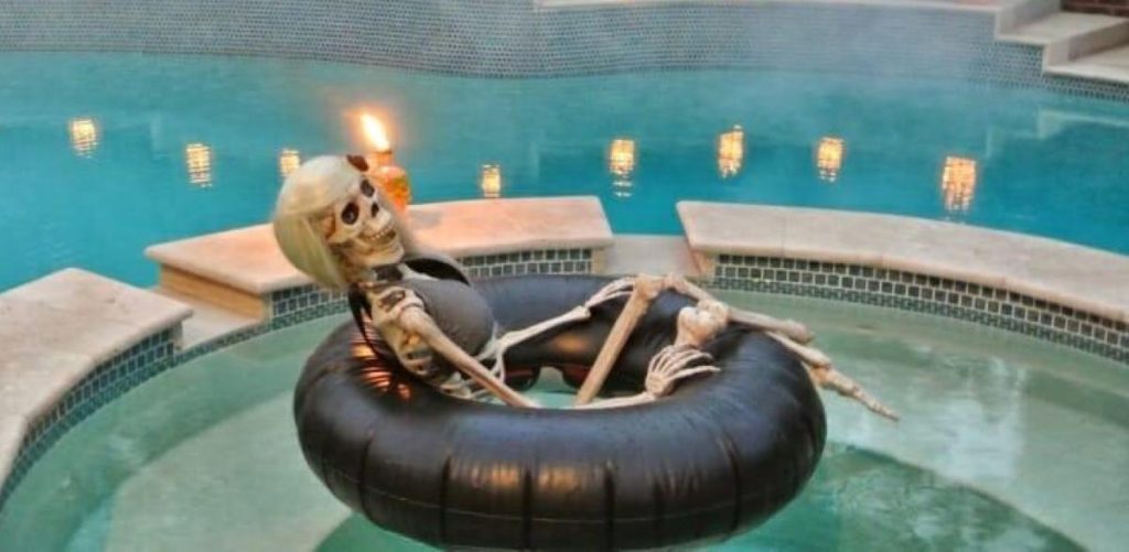 skeleton in a pool and hot tub